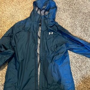 Under Armour zip up hooded rain jacket.